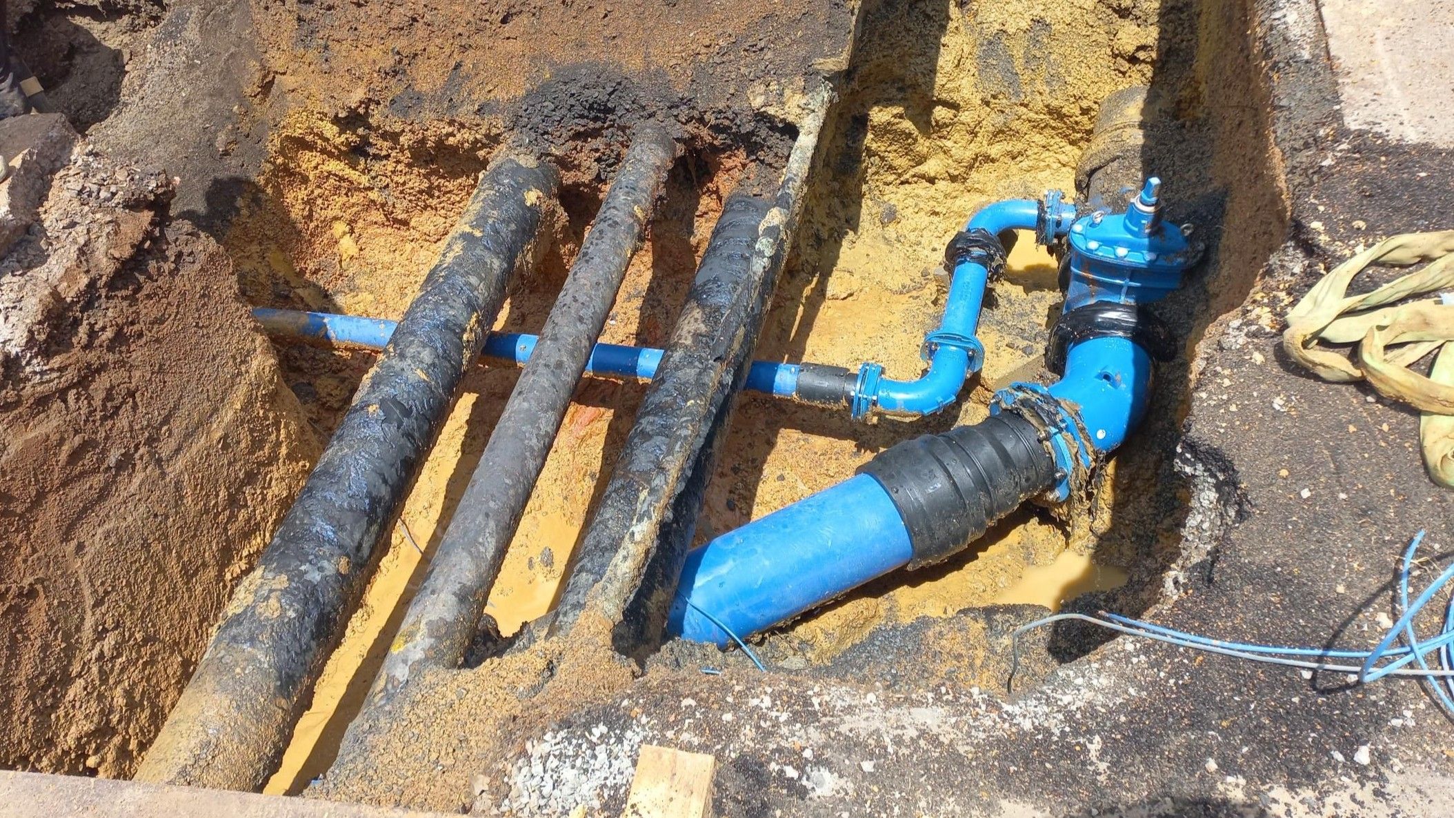 Photo showing exposed watermains during upgrade