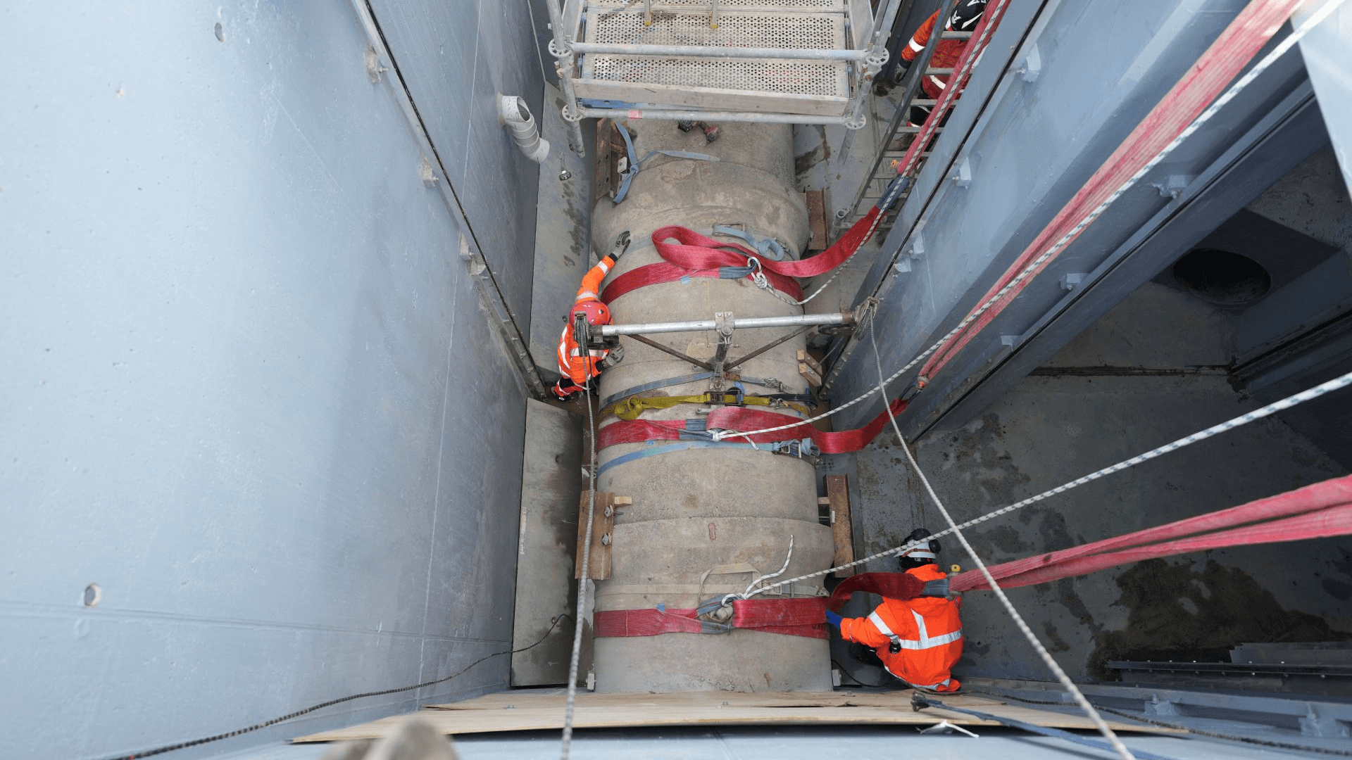 Crews prepare the seven-metre section of the Wairau Valley wastewater pipeline for cutting into two sections before it is lifted.jpg