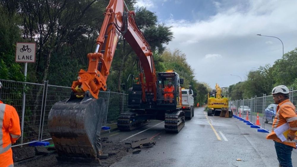 A digger excavates the road reserve on Kaipataki Rd