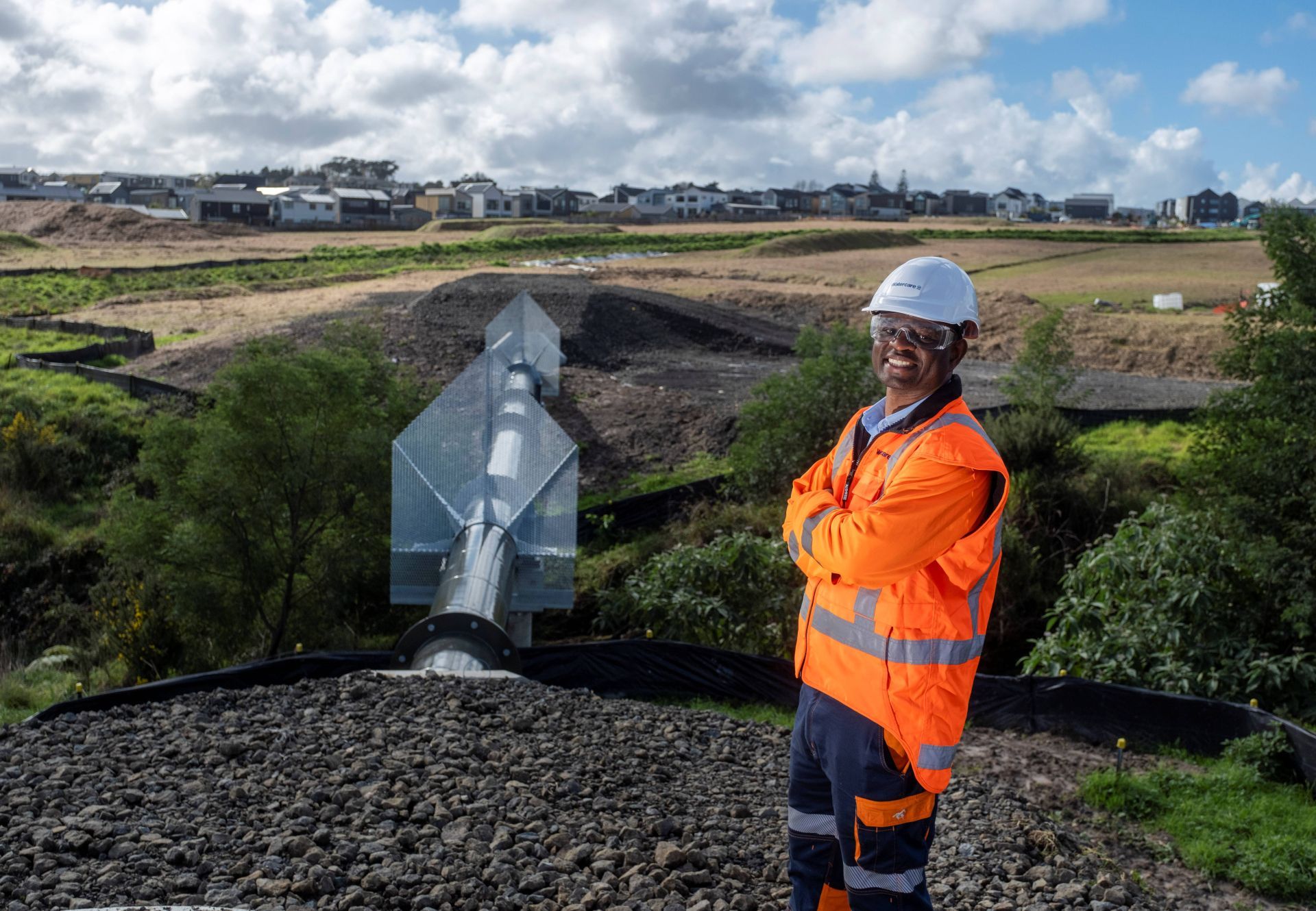 project_manager_ronald_gunda_in_front_of_pipe_bridge_jpg