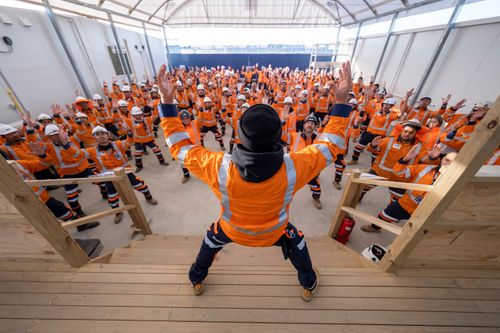 The Māngere Construction Team are taught the haka during a Cultural Awareness Toolbox Talk in 2020